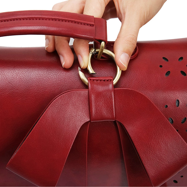 Victoria's Elegant Bow-Tie Satchel