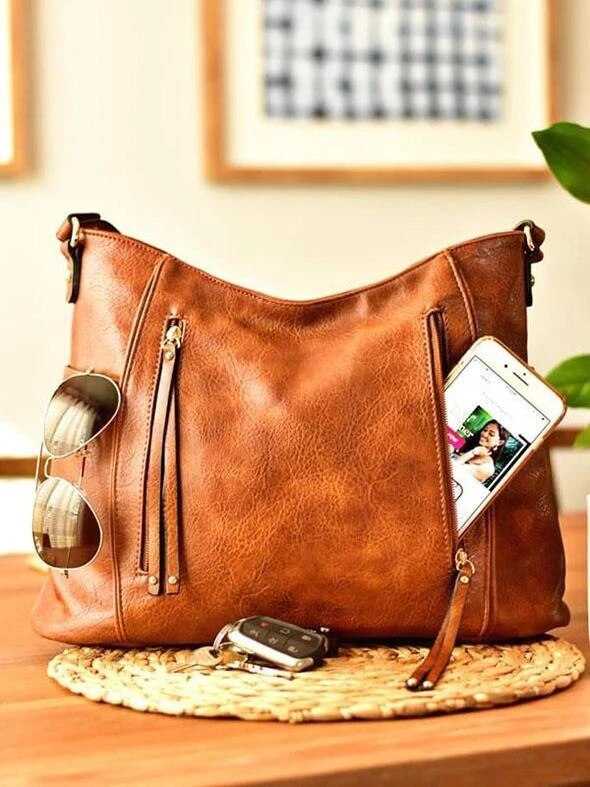 Victoria's Timeless Elegance | Vintage Leather Bag
