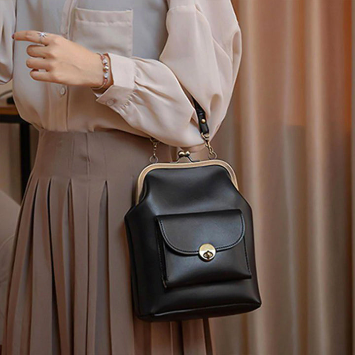 Vintage Kiss-Lock Leather Bag - Victoria's Retro Chic Essential